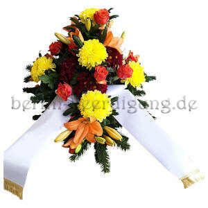 aufmunterndes Trauergesteck mit Lilien und Chrysanthemen
