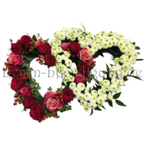 Liebevolles Herzgesteck in Rosa mit Nelken und Rosen inkl. Schleife Ø 60cm Zwei verbundene Herzen aus Rosen mit Schleife | in allen Farben möglich